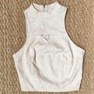 Cream crop top.
